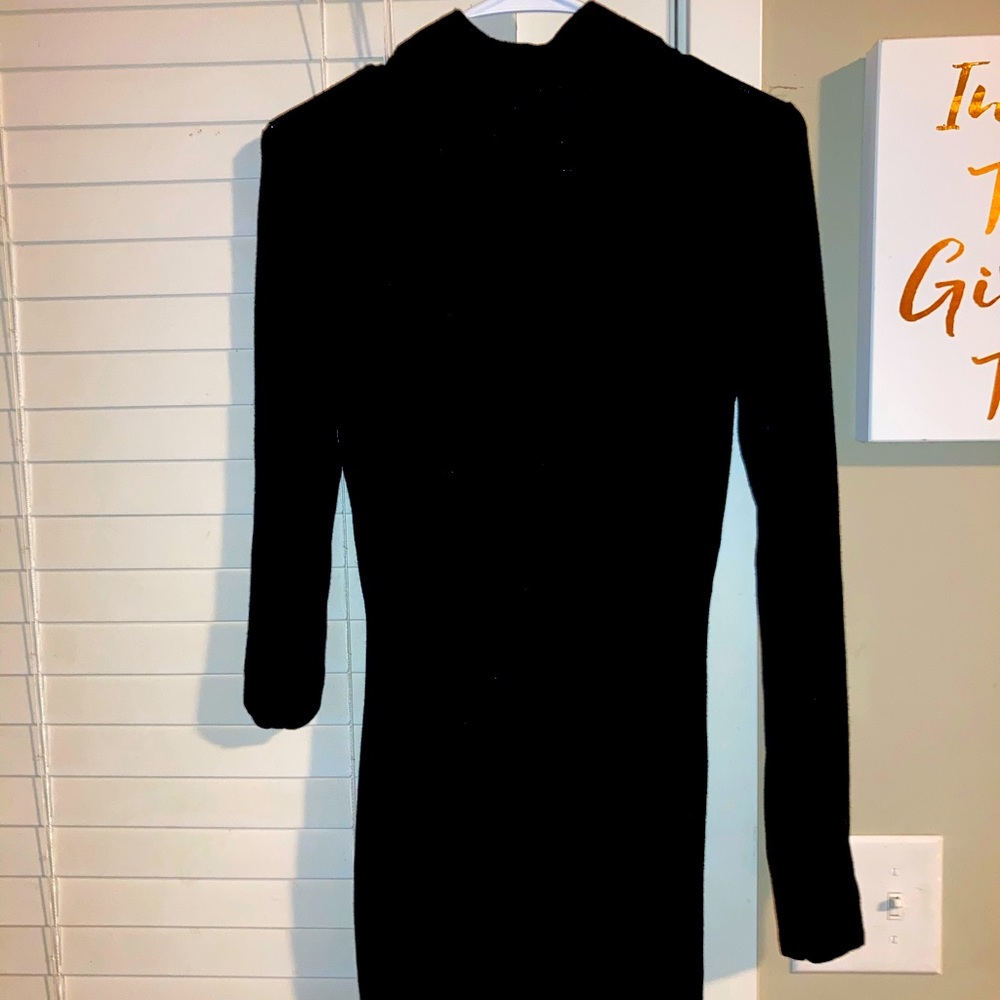 Sexy turtle neck black dress.